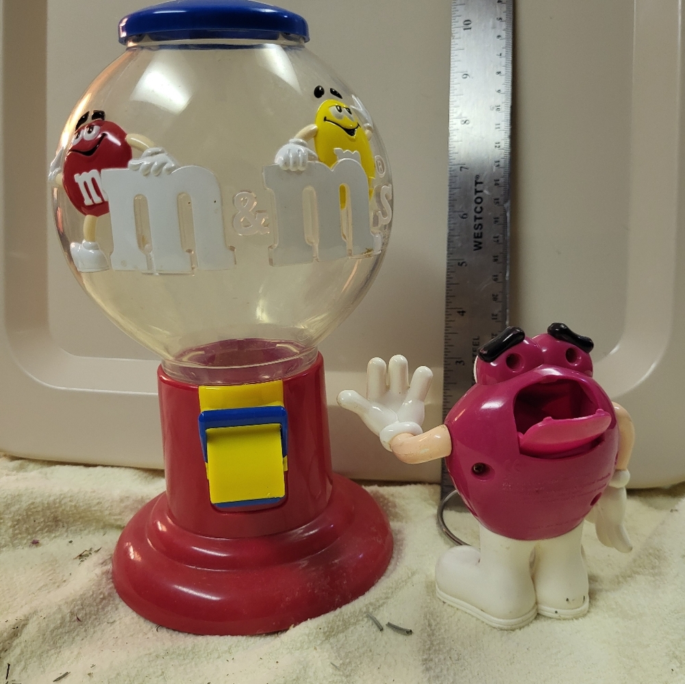 M&M large candy globe dispenser with small pink candy dispenser